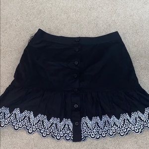 Black shirt with White embroidered trim
